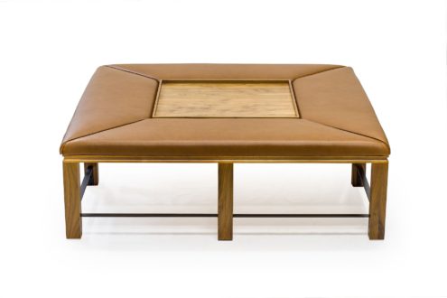 BW3398 Upholstered Coffee/Cocktail Table 54"w x 54"d x 17.5"h. Shown in Bleached Walnut with Leather Wrapped Cushions and Bronzed Stretchers.