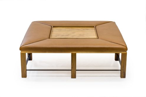BW3398 Upholstered Coffee/Cocktail Table 54"w x 54"d x 17.5"h. Shown in Bleached Walnut with Leather Wrapped Cushions and Bronzed Stretchers.